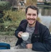 A young white man with smile