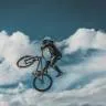 A man with a bike in sky